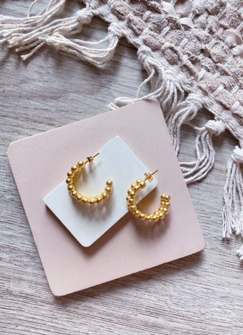 Aretes tipo candonga de aro abierto